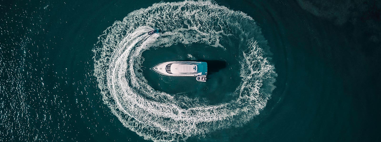 Jetski wake around yacht